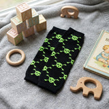 Wrapables Colorful Baby & Toddler Leg Warmers, Skulls Green