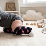 Wrapables Colorful Baby & Toddler Leg Warmers, Skulls Pink