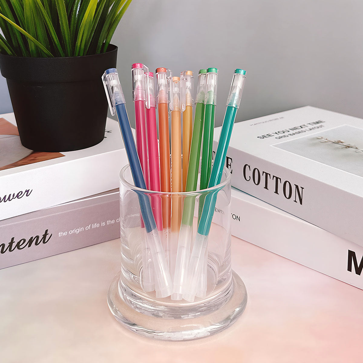 Colorful pens on shelf in stationery store Stock Photo by ©crPrin